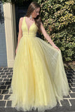 Robe de soirée longue en tulle jaune pailleté avec perles et coupe trapèze TP1252