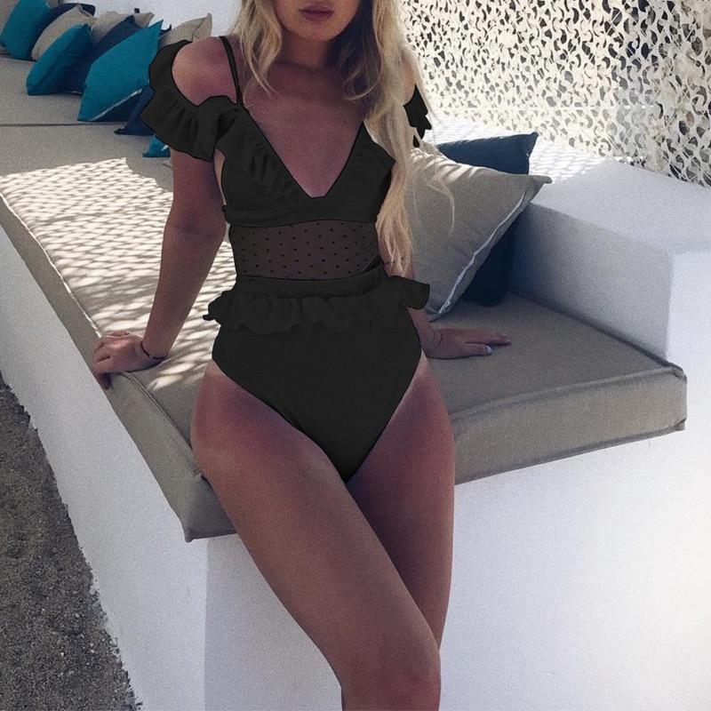 Girls in see through bathing suits on sale