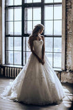 Sweetheart Tulle Sweep Train Ball Gown Wedding Dress With Appliques TN229